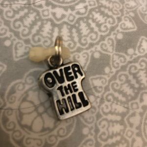 GANZ silver toned charm- over the hill